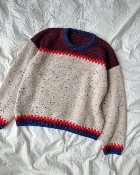 Cross sweater