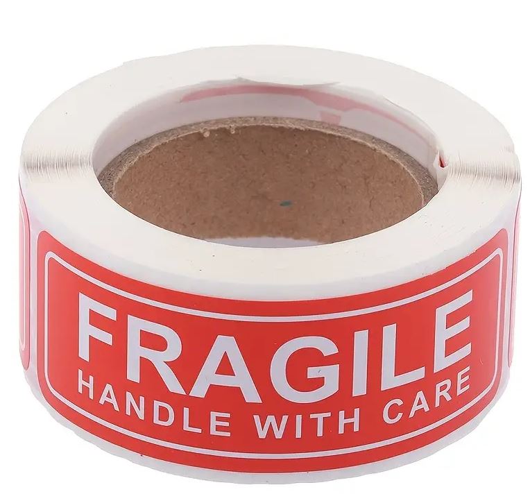 Små "Fragile" etiketter