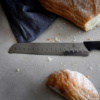 De Cuisson brødkniv 21 cm sort i porselen fra Porsgrund