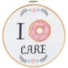 Geriljabroderi "I donut care" Ø 20cm