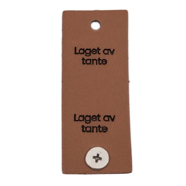 Merke Laget av tante 5x2cm