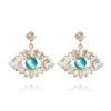 Greek eye statement earrings