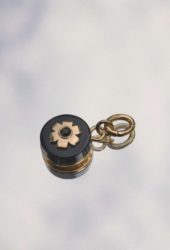 The black flower charm