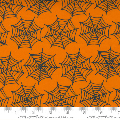 Halloween sort spindelvev på orange