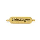 Merke metall oval "Håndlaget" 4x1,2cm