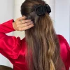 Hårklype blomst satenglook - Sort