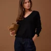 Clare Annemarie Frill Vneck