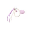 BAG CHARM LILLA SKJELL TINKA