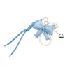 BAG CHARM  BLÅ SLØYFE TINKA
