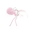 BAG CHARM ROSA PLYSJ HJERTE TINKA