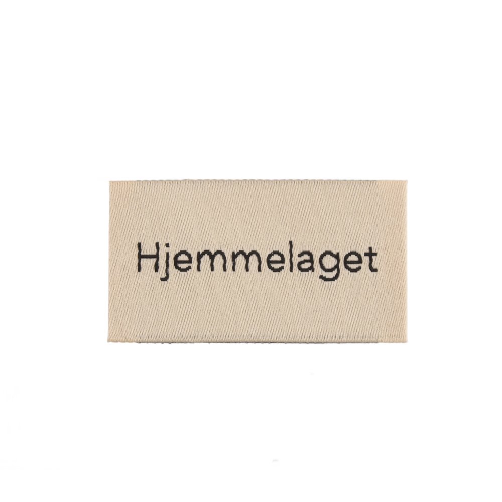 Symerke med tekst 25x45mm – Hjemmelaget