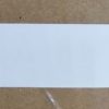 50x25 mm. TT Polyestester, Permanent lim (1500 stk. pr. rull)