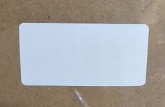 50x25 mm. TT Polyestester, Permanent lim (1500 stk. pr. rull)