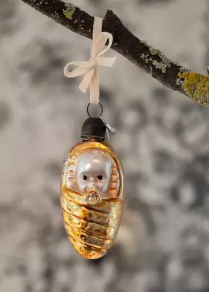 Deus living, Swaddled baby glass