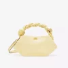 Ganni bou bag mini yellow cream