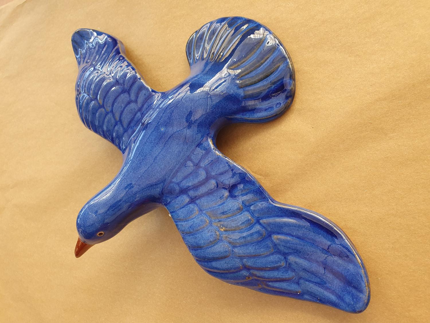 Fugl blå keramikk.